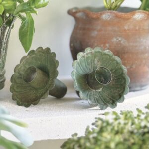 Green metal bottle candle holder